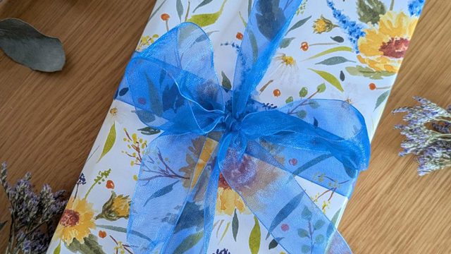 Hand painted, custom floral print wrapping paper and gift tags.